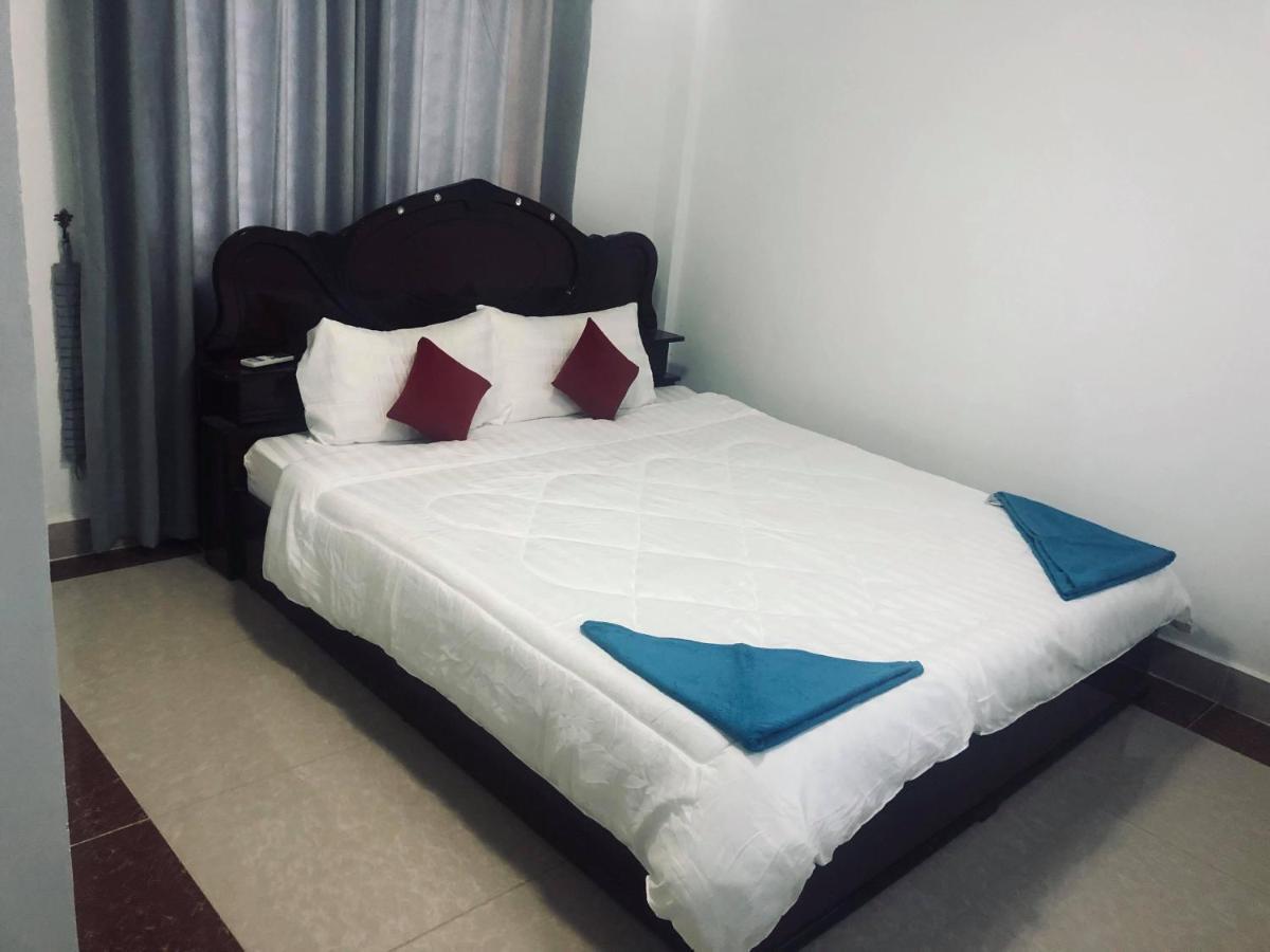 Ez Guesthouse Phnom Penh Bagian luar foto